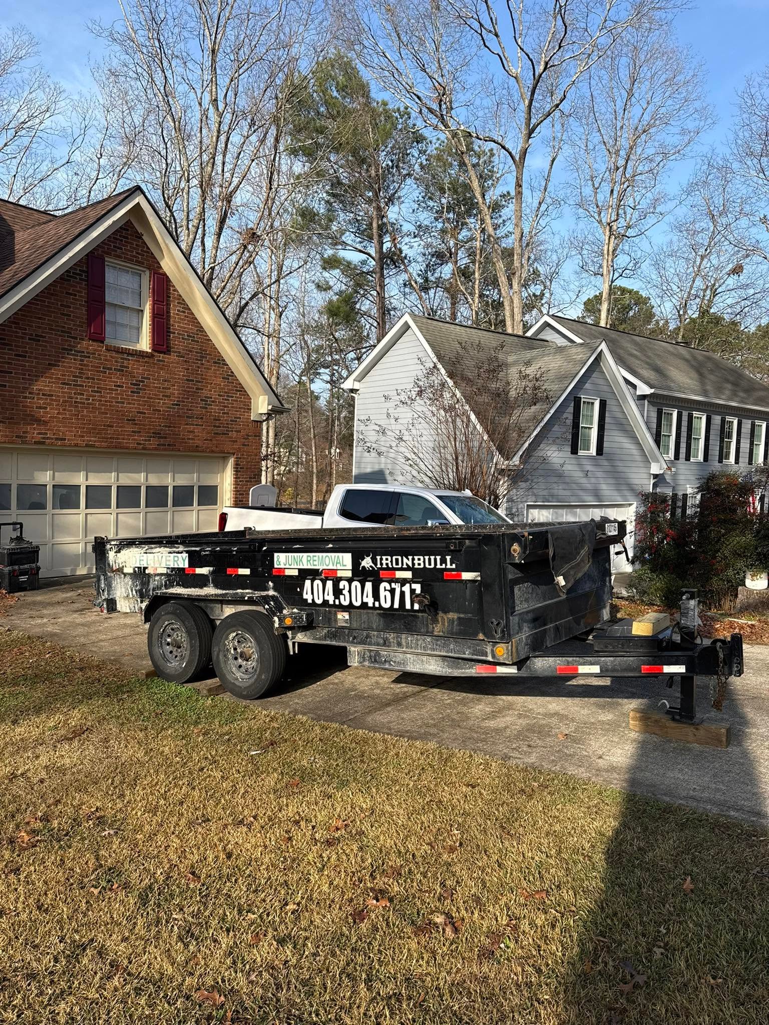 Bella Construction trucks and hauling equipment